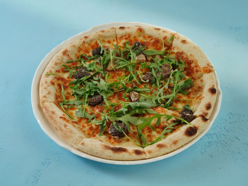 Anthonys coal fired specialty pizza with seasonal toppings