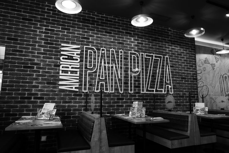 Anthony's Coal Fired Pizza restaurant interior with coal-fired oven